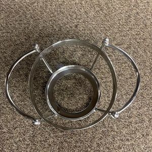 Pier 1 stainless steele candle holder 6inch tall by 9 in wide